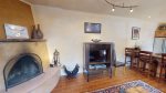 Sunflower SE living room with kiva fireplace 